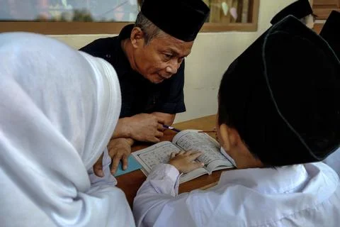 Learning to Recite The Quran Stock Photos