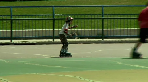 Learning to Rollerblade Stock Footage 471444