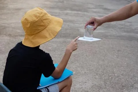 Learning science experiment about air pressure Stock Photos