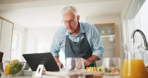 Learning, senior or man with tablet for cooking recipe tutorial, lunch and guide 스톡 사진
