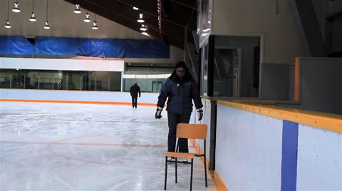 Learning to skate Stock Footage 1088242