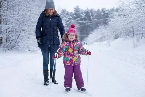 Learning to ski in forest Stock Photos