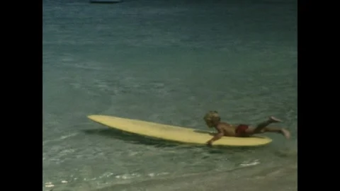 Learning to surf Stock Footage 252097436