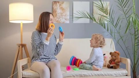 Learning through games and activities. Cognitive development through play. .. Stock Footage 252140876