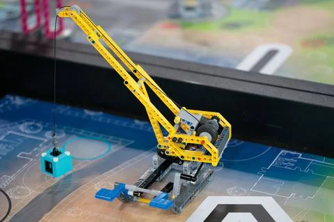 Learning through play, children's stand with educational robots. 写真素材