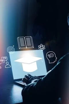 Learning through technology at home with a laptop and educational symbols in Stock Photos