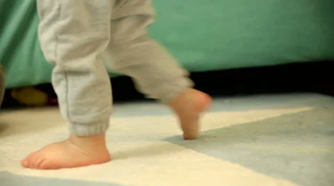 Learning to walk. FULL HD Stock Footage 48976248