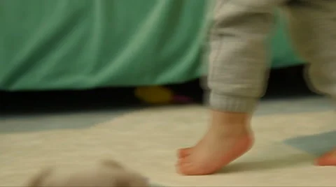 Learning to walk. SLOW MOTION. FULL HD Stock Footage 49030821