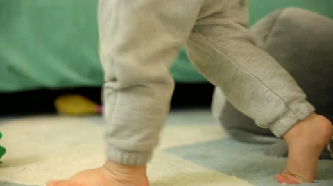 Learning to walk.FULL HD Video stock 48975206