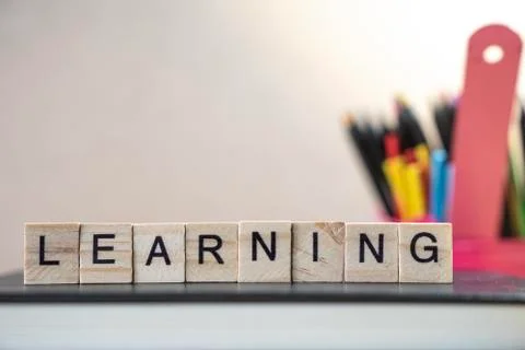 Learning word collected from wooden elements with the letters, education deve Stock Photos