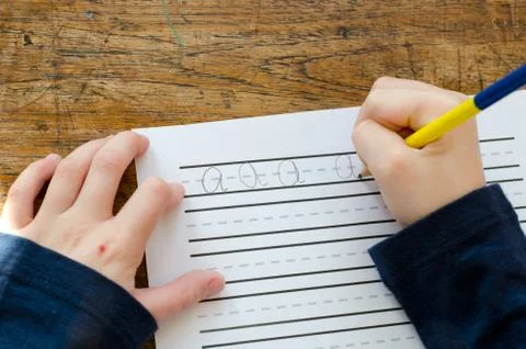 Learning to write abc Stock Photos
