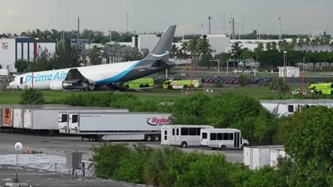 At least five dead after Amazon cargo plane crashes near Miami airport, Nueva Yo Stock Footage 344829150