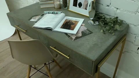 Leat magazines on the table, brands, Dior, Gucci and others. stone table and Stock Footage 168472667