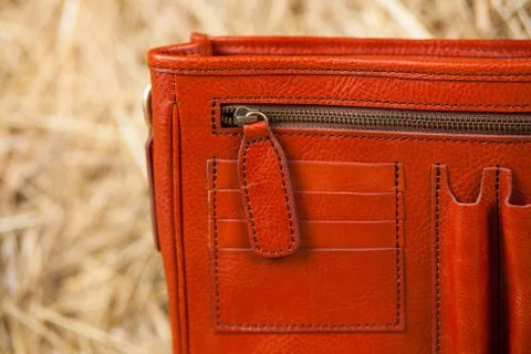 Leather bag in the hay Stock Photos