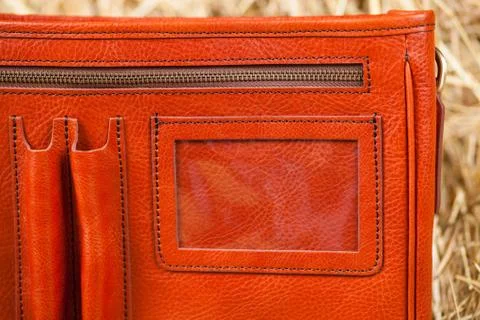Leather bag in the hay Stock Photos
