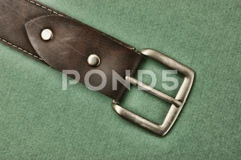 Leather belt with a buckle Stock Photos