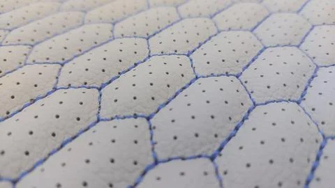 Leather blue stitched with perforated pattern honeycomb Stock Photos