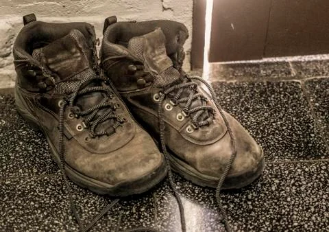 Leather boots on the floor Stock Photos