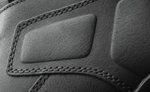 Leather boots stitched with thread close up Stock Photos