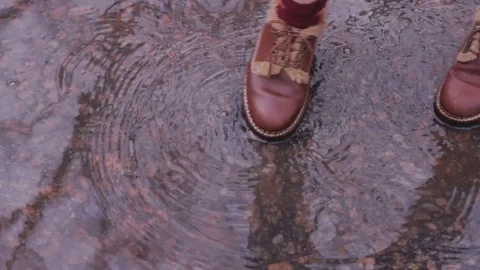 Leather bootst in autumn streets Stock Footage 84993107