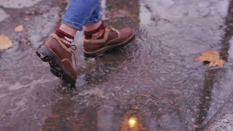 Leather bootst in autumn streets Stock Footage 84993115