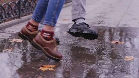 Leather bootst in autumn streets Stock Footage 84993167