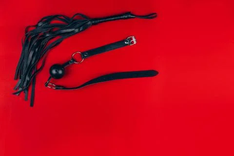 Leather braid on a red background, Foto stock