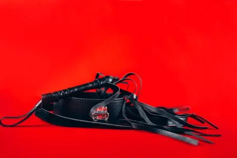 Leather braid on a red background, Stock Photos