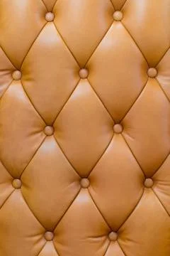 Leather buttoned armchair back Stock Photos