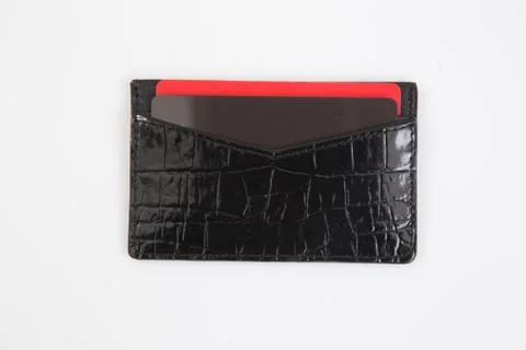 Leather card case on the white background. Stock Photos