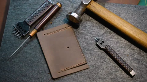 Leather Craft Tools and Wallet in Progress Stock Footage 296348595