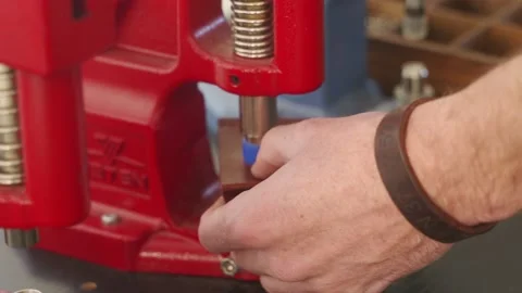 Leather craftsman works in workshop. Master making leather wallet. Man installs Video stock 199294664