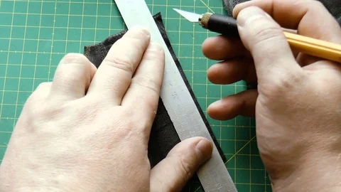 Leather cutting with a knife Stock Footage 78912555