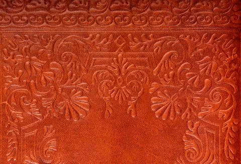 Leather floral pattern deep red color background Stock Photos