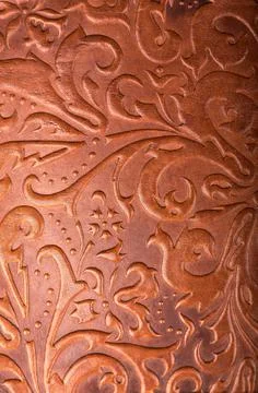 Leather floral pattern deep red color background Stock Photos