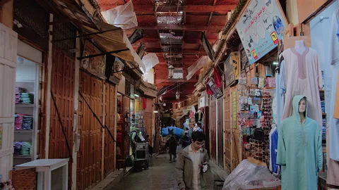Leather goods and clothes stores in Place Lalla Yedounna, Fes, Morocco Video stock 305586085