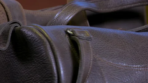 Leather goods craftsman at work in his workshop 스톡 동영상 59100543