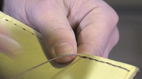 Leather goods craftsman at work in his workshop Stock-Footage 59108653