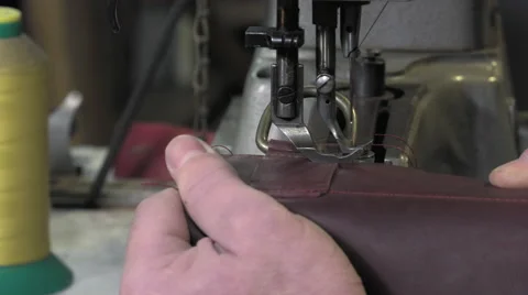 Leather goods craftsman at work in his workshop Stock-Footage 59109377