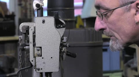 Leather goods craftsman at work in his workshop Stock-Footage 59110909