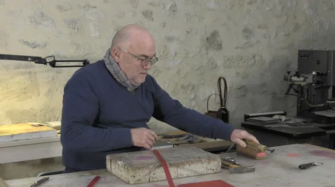 Leather goods master craftsman at work Stock Footage 61155697