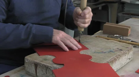 Leather goods master craftsman at work Video stock 61157491
