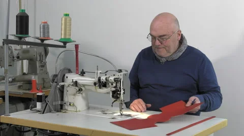 Leather goods master craftsman at work Stock Footage 61158480