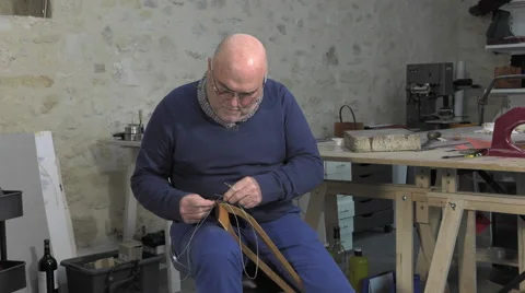Leather goods master craftsman at work Stock Footage 61160052