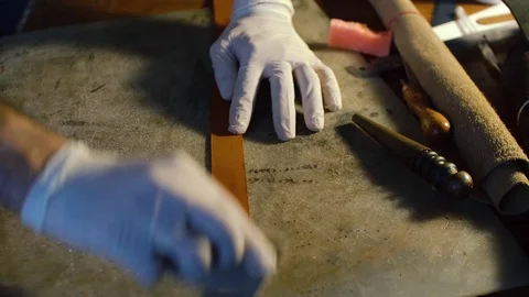 Leather handbag craftsman at work in a workshop Stock Footage 71390101