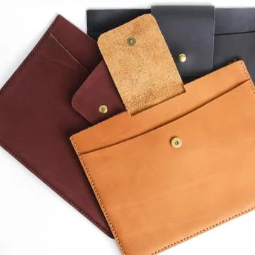 Leather handmade, tablet case, wallet Stock Photos