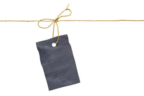 Leather label with bow Stock Photos