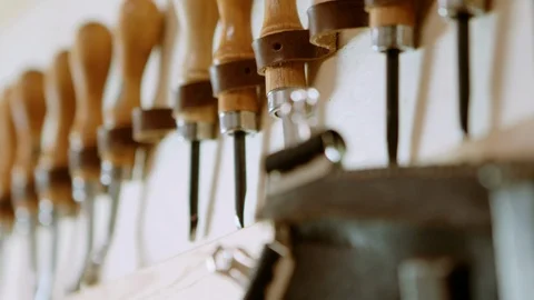Leather making edge bevel tool. slow motion Stock Footage 96133252