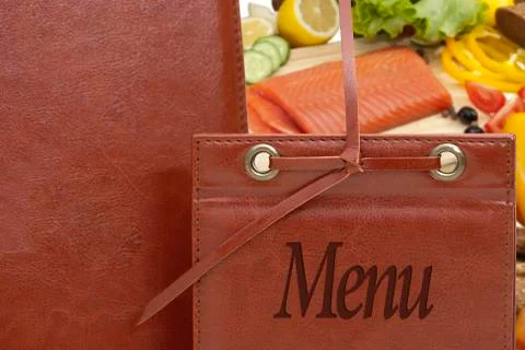 Leather menu in a restaurant Stock Photos