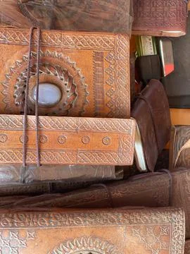 Leather old book lying on the open market Stock Photos
